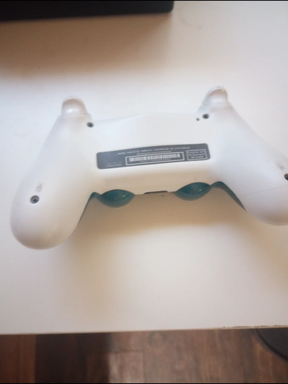 White Wireless Game Controller with Teal Accents